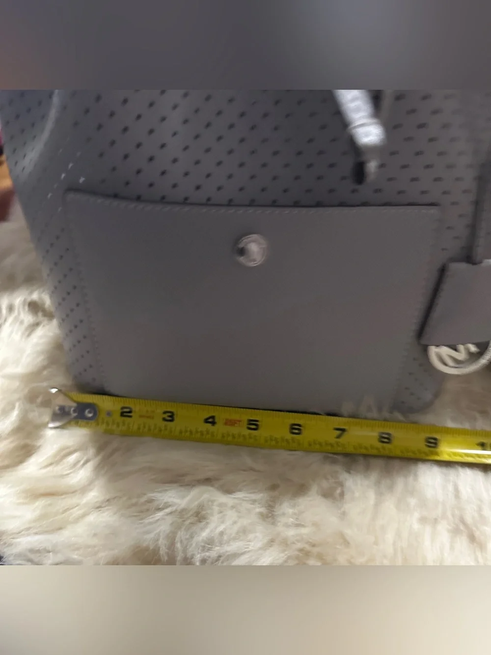 Michael Kors Perforated Drawstring Bucket Bag in Gray